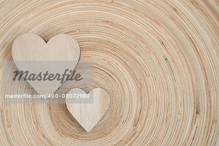 valentine's wooden hearts on a wooden background , valentine's day, day valentine postcard with space for text
