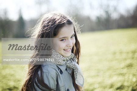 Portrait of a 7 years old girl in the countryside