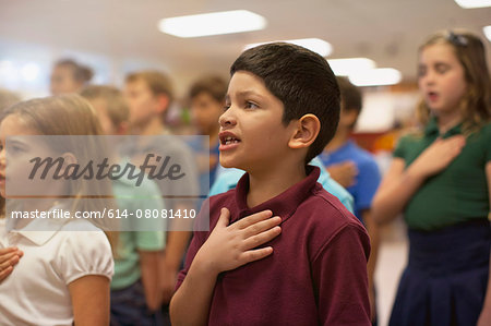 Children reciting Pledge of Allegiance in school