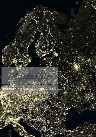 Eastern Europe and Scandinavia at night in 2012. This satellite image with country borders shows urban and industrial lights. Eastern Europe and Scandinavia at night in 2012. This satellite image with country borders shows urban and industrial lights.