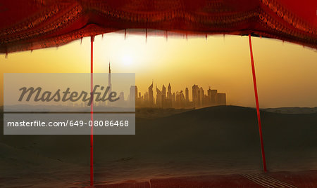 Futuristic cityscape from bedouin tent, Dubai, United Arab Emirates