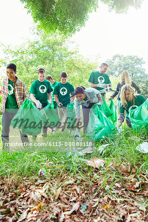 Environmentalist volunteers picking up trash