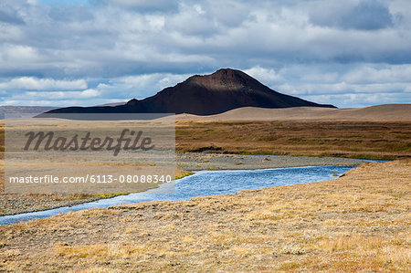 Stream running through volcanic landscape, Myvatn, Iceland