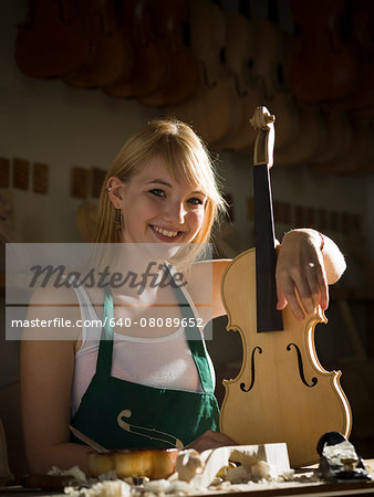 violin maker in the workshop