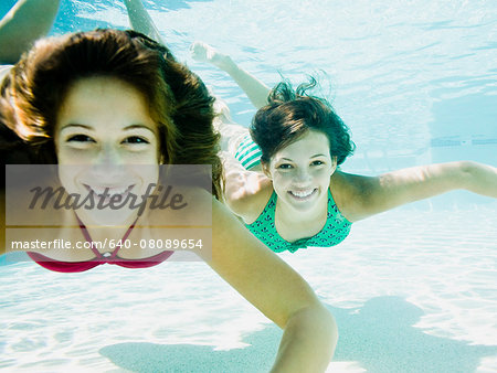 teenagers in a swimming pool