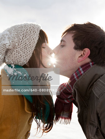 USA,Utah,Orem,Young couple kissing outdoors on a winter day