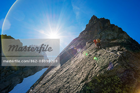 Europe, France, Haute Savoie, Rhone Alps, Chamonix Valley, rock climber on Aiguille de l'M
