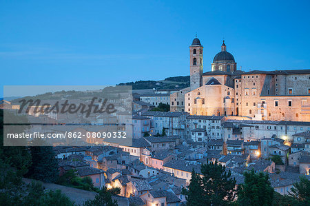 View of Urbino (UNESCO World Heritage Site) at dusk, Le Marche, Italy