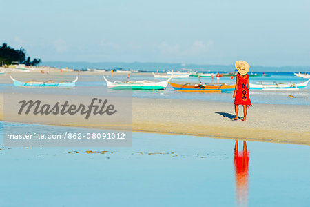 South East Asia, Philippines, The Visayas, Cebu, Bantayan Island, girl on Paradise Beach (MR)