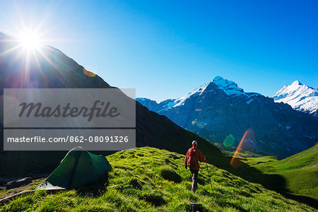 Europe, Switzerland, Swiss Alps Jungfrau-Aletsch Unesco World Heritage site, hiker and campsite, Wetterhorn 3692m above Grindelwald MR