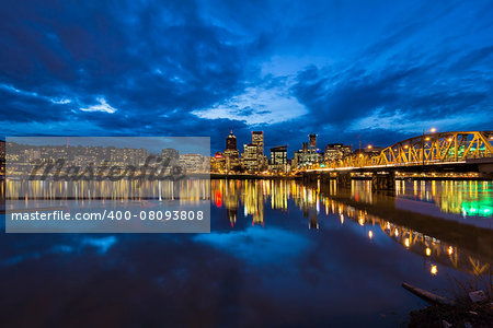 Hawthorne Bridge Over Willamette River to Portland Oregon Downtown City Skyline During Evening Blue Hour