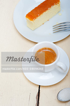 italian espresso coffee and cheese cake over white wood table