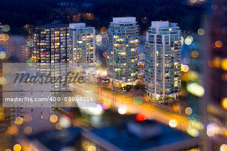 Vancouver British Columbia Cityscape with Blurred Defocused City Lights During Evening Blue Hour