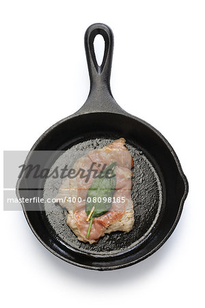 saltimbocca alla romana ( cooked veal, prosciutto and sage ) on skillet