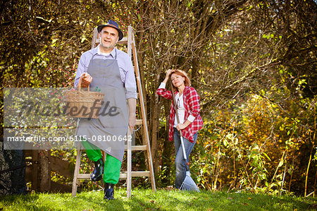 Family picking apples, Munich, Bavaria, Germany