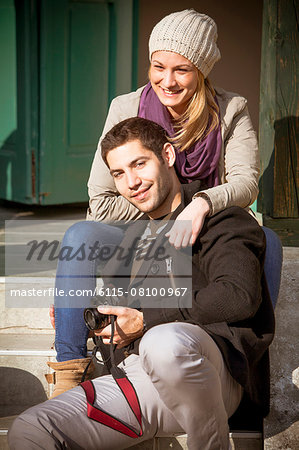 Portrait of happy young couple outdoors