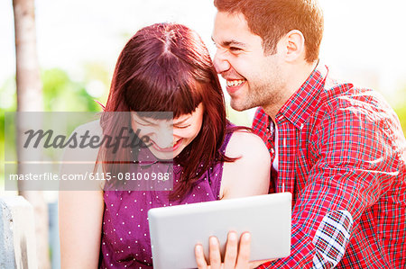 Young couple with digital tablet having fun, Osijek, Croatia