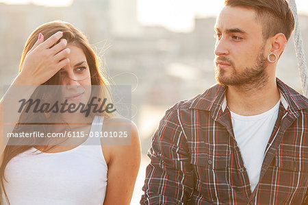 Portrait of young couple outdoors