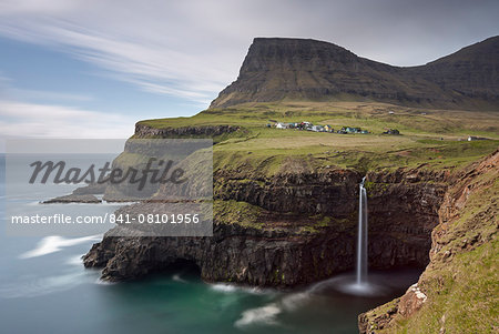 Beautiful coastal scenery beside the village of Gasadalur on the island of Vagar, Faroe Islands, Denmark, Europe
