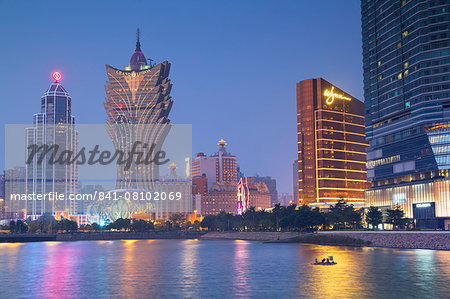 Grand Lisboa and Wynn Hotel and Casino at dusk, Macau, China, Asia Grand Lisboa and Wynn Hotel and Casino at dusk, Macau, China, Asia