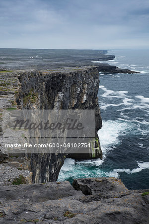 Scenic view of cliffs and coastline viewed from Dun Aonghasa, Aran Islands, Republic of Ireland Scenic view of cliffs and coastline viewed from Dun Aonghasa, Aran Islands, Republic of Ireland
