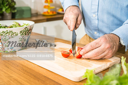 Person preparing salad