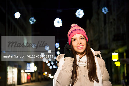 Portrait of young woman using smart phone