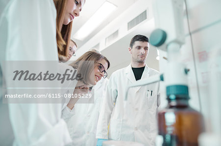 Scientists working in lab Scientists working in lab