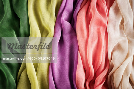 Close-up of five colourful summer scarves, studio shot Close-up of five colourful summer scarves, studio shot
