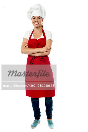 Isolated studio shot of experienced female chef