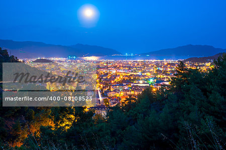 full moon above the spa town of the Aegean Sea