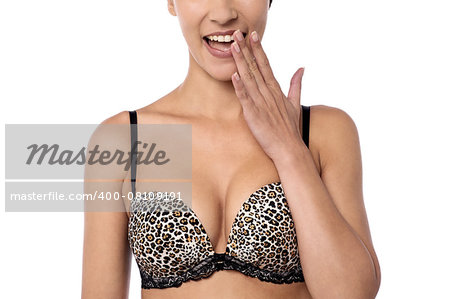 Cropped image of a woman in designer bra