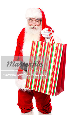 Santa giving away gift bags over white background