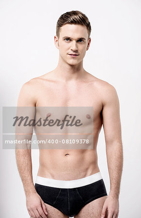 Shirtless male model in black underwear