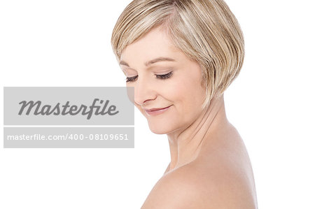 Side pose of topless woman posing to camera