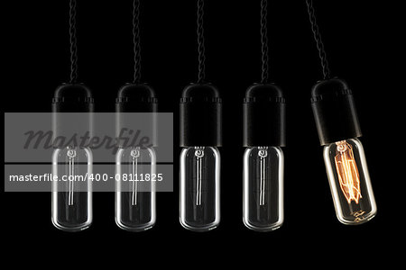 Newtons cradle pendulum with vintage style lightbulbs