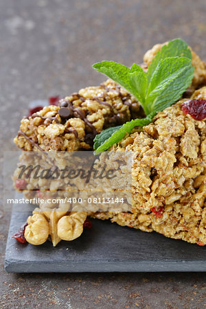 homemade muesli bars with cranberries, nuts and chocolate