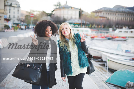 Portrait of two young female friends  at Lake Como, Como, Italy