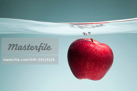 Red apple underwater