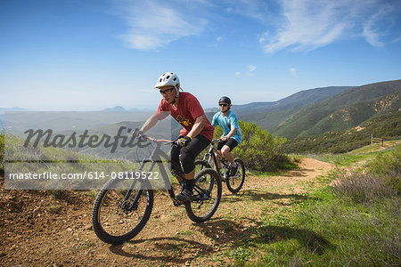 Cyclists mountain biking, San Luis Obispo, California, United States of America