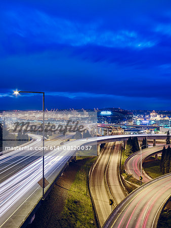 Traffic light trails on city flyover at night, Seattle, Washington State, USA