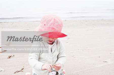 Baby girl on beach