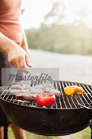 Man having barbecue