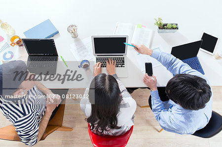 Multi-ethnic business people working in modern office