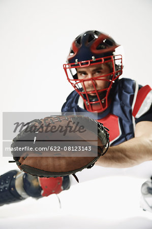 Baseball catcher against white background
