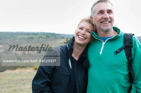 Hiking couple in rural landscape