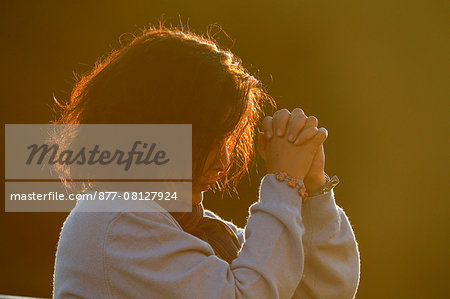 Woman praying. Saint-Gervais-les-Bains. France.