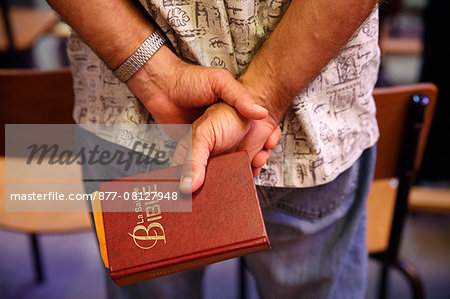 Baptist holding a Bible. Massy. France.