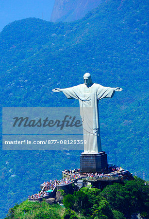 Aerial view from helicopter to Christ the Redeemer statue located at the top of Corcovado mountain in Rio de Janeiro, Brazil, South America