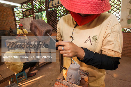 Cambodia,Siem Reap,Artisans Angkor Workshop,Carving Buddha Head